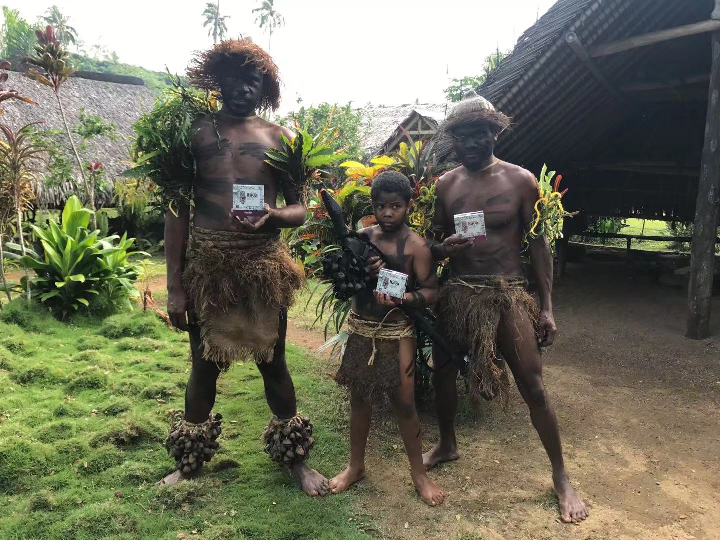 Vanuatu villagers holding Kava King products